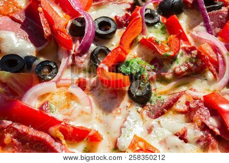 Appetizing Pizza With Meat And Vegetables Close-up