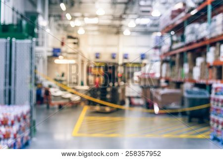 Filtered Tone Blurry Background Worker Stack Goods On Forklifts At Wholesale Store In Usa