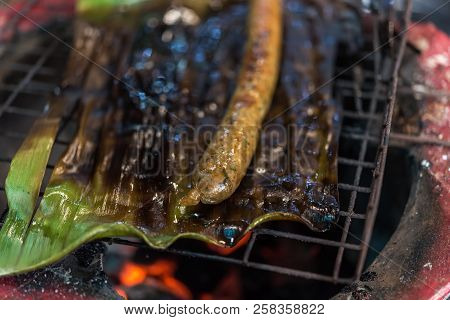Roasted Or Grilled Notrhern Thai Spicy Sausage (sai Aua) For Sale At Thai Street Food Market Or Rest