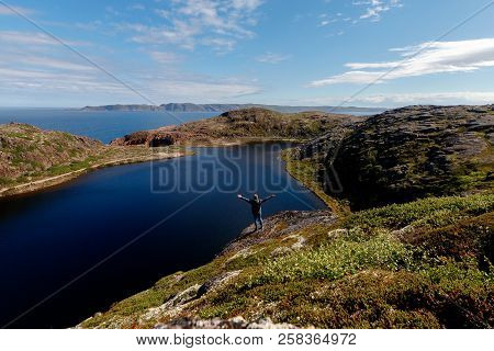 View Of Mountain Lake And Open Ocean In Tundra, Teriberka.