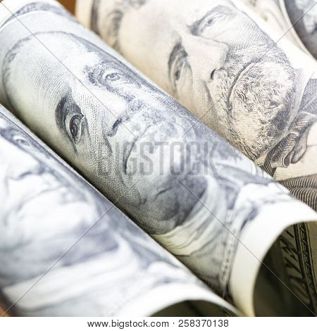 Blurred Dollars Banknote Rolled Up