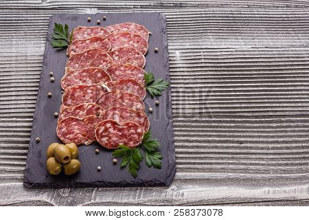 Saucisson Sec Delicious French Salami On A Wooden Background