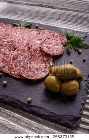 Saucisson Sec Delicious French Salami On A Wooden Background