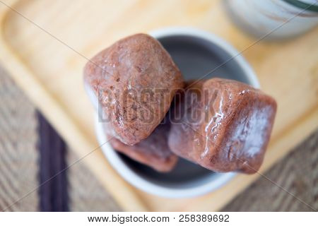 Frozen Chocolate Ice Cubes In A Glass You Can Poured With Milk To Make A Refreshing Summer Drin