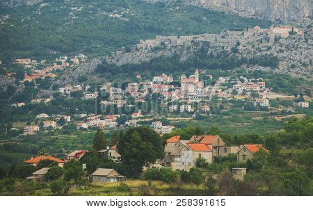 Fortress Of Klis And Old Village In Croatia.