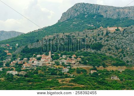 Fortress Of Klis And Old Village In Croatia.