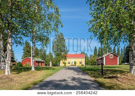 Pajala, Sweden - August 8, 2018: The Manse In Pajala In Northern Sweden. The Red Building To The Rig