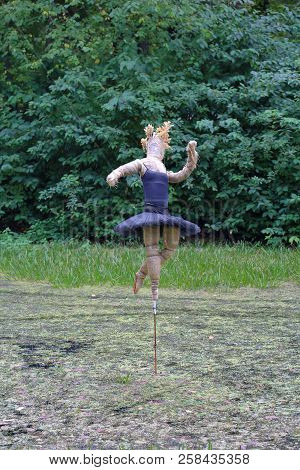 Ballerina Made Of Cloth Over The Water