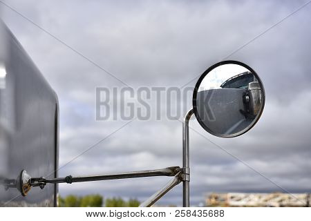 An Abstract Image Of The Side View Mirror On An Industrial Transport Truck.