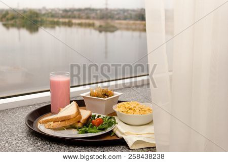 Breakfast In The Hotel Room Near The Window