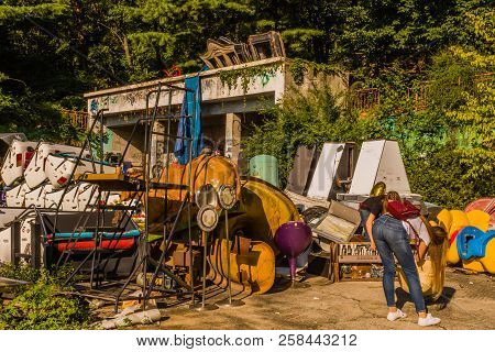 Seoul, South Korea; September 8, 2018; Two Unidentified Young Women Rifling Through Old Used Part Of