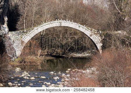 Landscape Of Ancient Bridge Of Kontodimos Or Lazaridis In Vikos Gorge And Pindus Mountains, Zagori, 