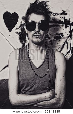 Portrait Of Young Punk In Round Sunglasses