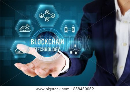 Businessman Holding Blockchain Icon On Virtual Screen,blockchain Technology Concept,elements Of This