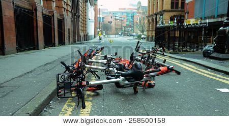 A Photo Of A Group Of Mobike Cycles Dumped In The Street In Manchester City Centre, Uk, April 8th 20