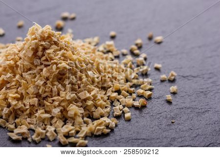 Fragrant Dried Parsnip On A Dark Stone Background