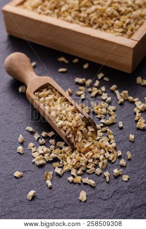 Fragrant Dried Parsnip On A Dark Stone Background