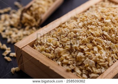 Fragrant Dried Parsnip On A Dark Stone Background