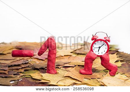 Daylight Saving Time. Wall Clock Going To Winter Time. Autumn Abstraction.