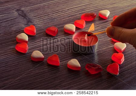Jelly Candies In Shape Of Beautiful Heart With Candle Flame
