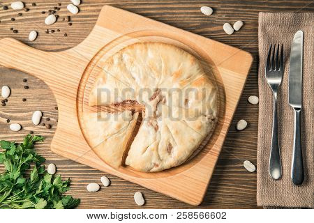 Round Meat Pie. Traditional Dish Of The Cuisine Of The Caucasus