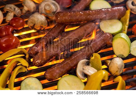 Sausages And Vegetables On The Grill