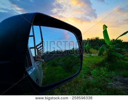 The Difference Between The Tones Of The Sky Above Agriculture Field At Evening. When Looking At The 