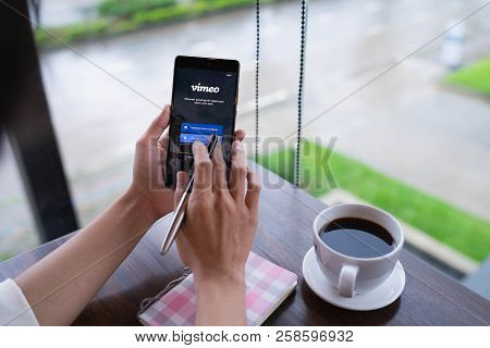 Chiang Mai, Thailand - August 18,2018: Woman Hands Holding Huawei With Vimeo On Screen.  Vimeo Is A 