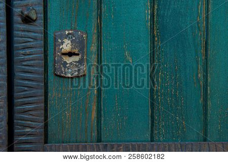 Old Rusty And Dusty Keyhole Wallpaper. Vintage Keyhole On Old Wooden Door Background. Keyhole Of Old