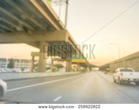 Blurry Background Highway Interstate With Elevated Road Viaducts At Sunrise In Usa