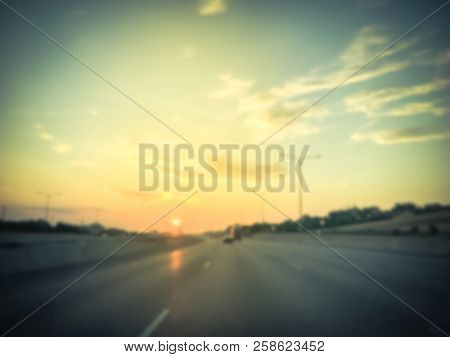 Filtered Tone Blurry Background Usual Traffic Condition On Highway Interstate At Sunrise In Usa