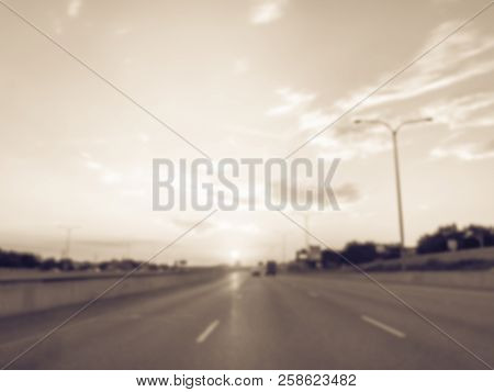 Filtered Tone Blurry Background Usual Traffic Condition On Highway Interstate At Sunrise In Usa