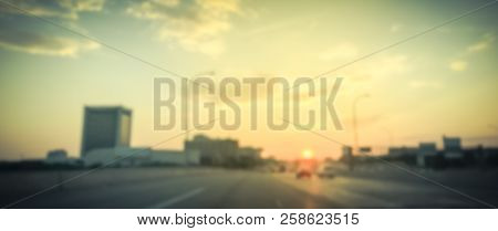 Panoramic Blurry Background Usual Traffic Condition On Highway Interstate At Sunrise In Usa