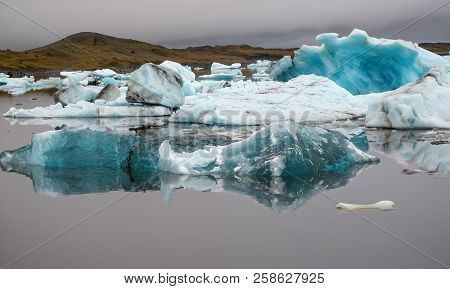 Icebergs At Jökullsárlón Glacier Lagoon, At A Misty Summer Evening