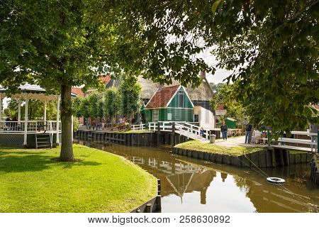 Enkhuizen, Netherlands - August 19, 2015 - The Houses And People In The Traditional Fisherman Villag