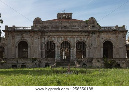 Ancient Spa In Leghorn, Crumbling Building Architectural Monument In Italy.