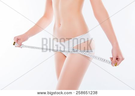 Cosmetology Liposuction Weight Loss Concept. Cropped Close Up Photo Of Ideal Perfect Woman's Body In