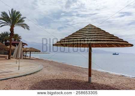 Beautiful Public Sandy Beaches On Red Sea In Eilat With Stro Umbrellas, Luxury Vacation Spa Resorts 