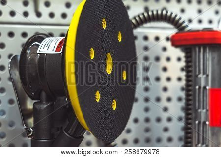 Electric Tools For Construction On The Stand In The Shop