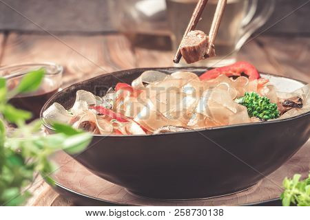 Hot Asian Spicy Dish Thick Cut Glass Noodles Mung Fungosa Beans In Sweet Sour Sauce