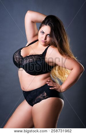 Plus Size Sexy Model In Black Lingerie, Fat Woman On Gray Studio Background, Overweight Female Body,