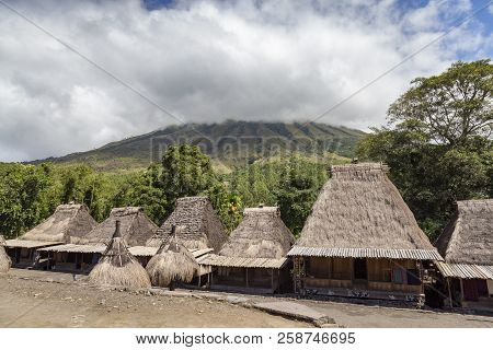 View Of Traditional Houses And Mount Inerie In The Bena Traditional Village In Flores, Indonesia.