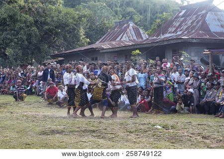 Bajawa, Indonesia - May 19: Unidentified Crowds Gather For A Traditional Boxing Match During Harvest