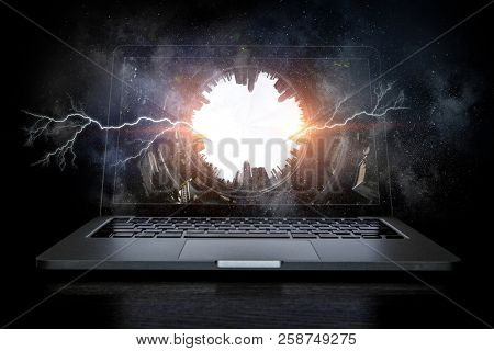 Laptop and construction concept. Mixed media