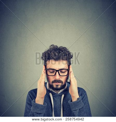 Closeup Sad Young Man With Worried Stressed Face Expression. Obsessive Compulsive, Adhd, Anxiety Dis