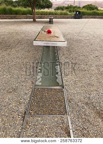 Arlington, Virginia, Usa - September 11 2018: Flower On A Benche At Pentagon Memorial Laid On 9 Sept