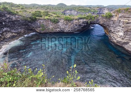 Beautiful Clear Blue Waters At The Broken Beach Lagoon In Nusa Penida.