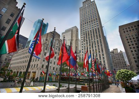 New York, Usa - August 23, 2018: Rockefeller Center, Flagpoles With Flags Of United Nations Member C