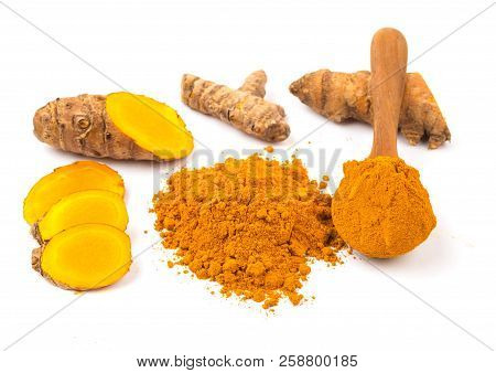 Turmeric Powder (curcuma) And Fresh Turmeric On White Background. Herbs