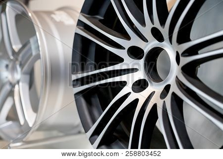 Alloy Wheels In Wheel Shop.wheel Rims On Showcase. Car Alloy Wheels At A Wheel Shop Or Automobile Ex